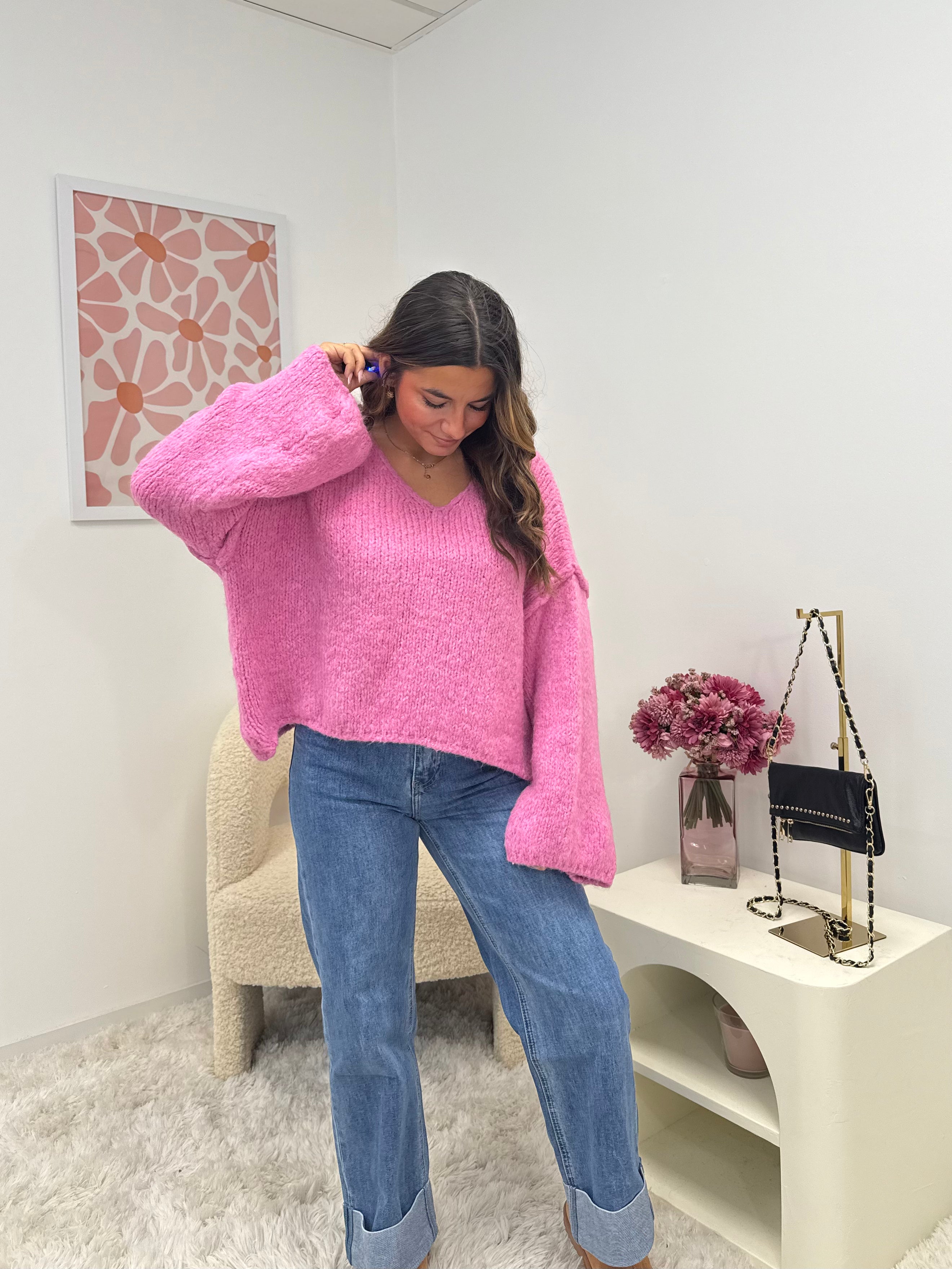 pull en laine rose col V