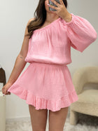 Combi-short asymétrique rose, détail de la découpe asymétrique